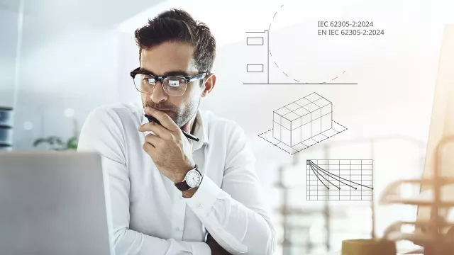 A person looking at the screen of a laptop. 